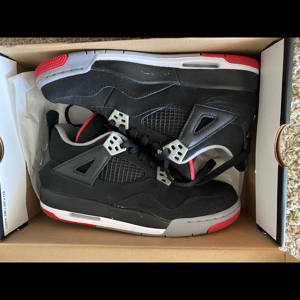 Jordan 4s size 5.5 youth (kids size) 7 in women